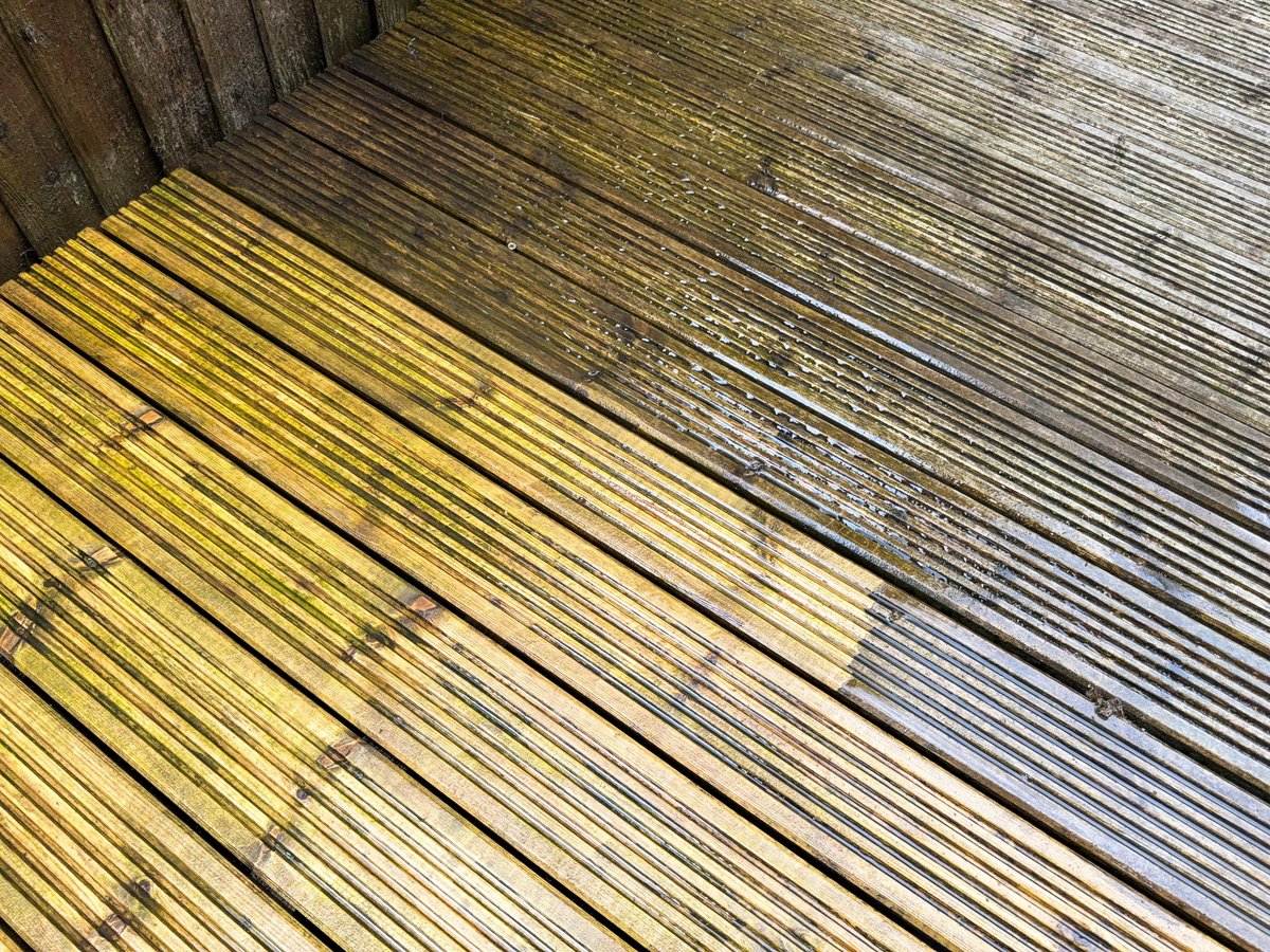 Before and after wooden deck pressure washing